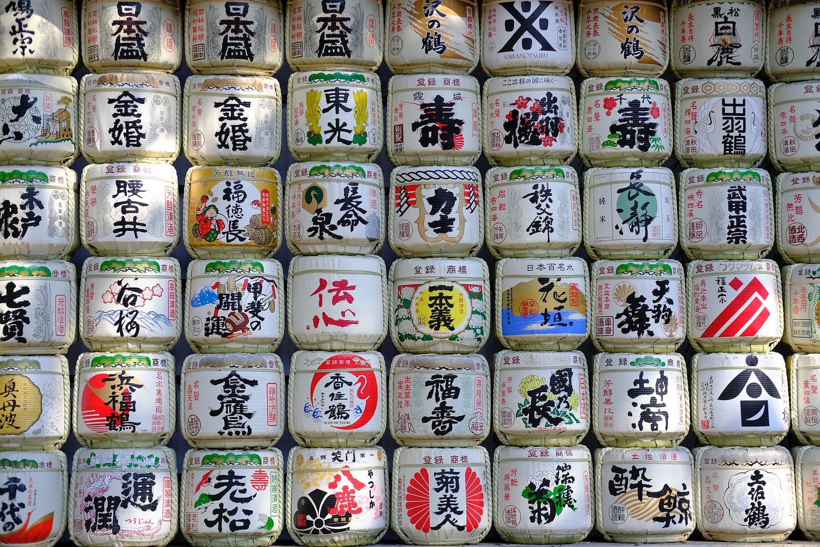 Stack of various Chinese tea jars with character inscriptions for chinese culture quiz
